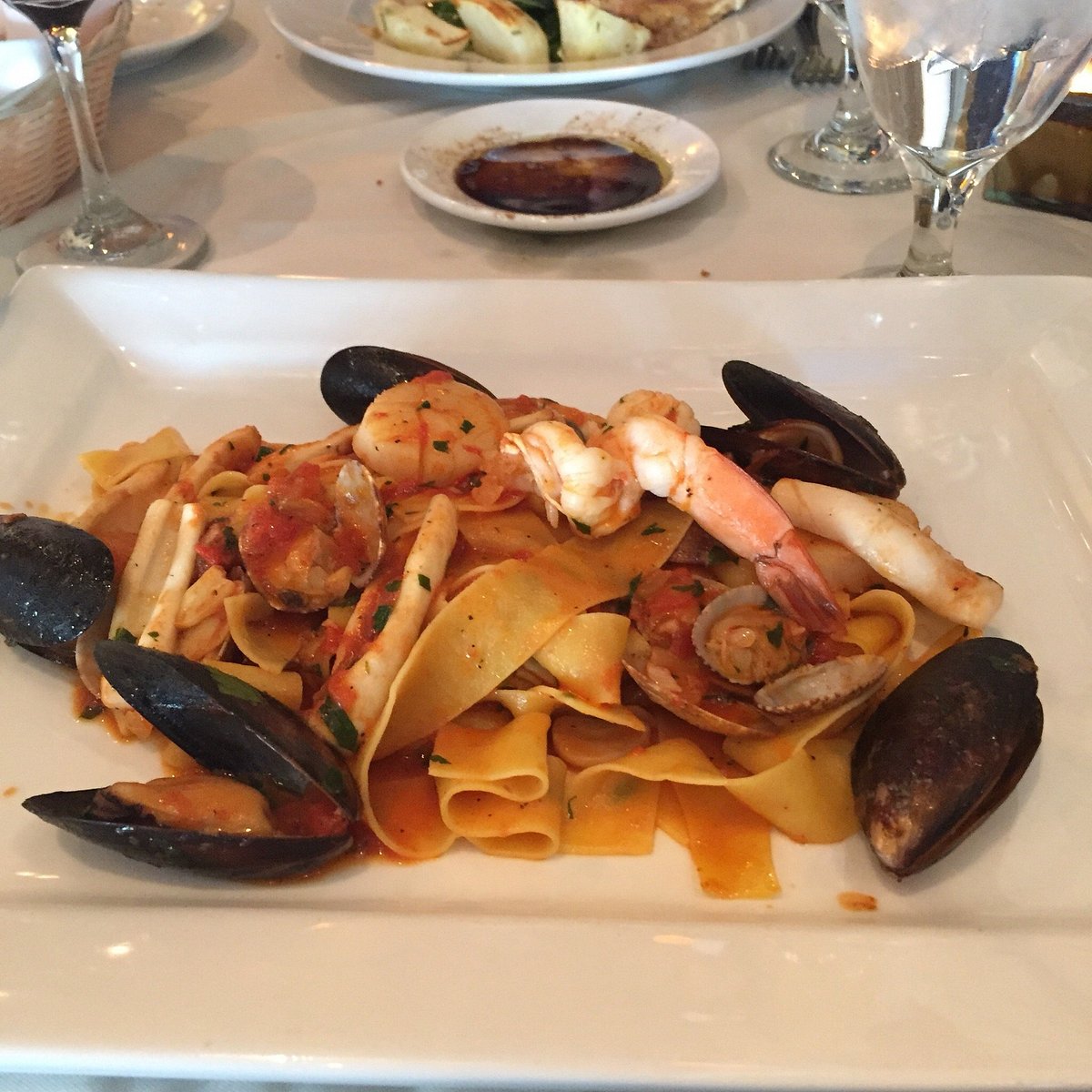 Adriatico Trattoria Italiana signature dishes Zuppa di Pesce CioppinoRavioli di Vitello (Veal ravioli)Spaghetti Neri Frutti di Mare (Squid ink pasta with seafood)Gnocchi al Pesto﻿﻿